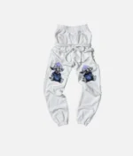 Billionaire Studios Binky Troll Tracksuit White front view" "Back design of Billionaire Studios Binky Troll Tracksuit" "Binky Troll Tracksuit White close-up logo" "Model wearing Billionaire Studios Tracksuit outdoors"