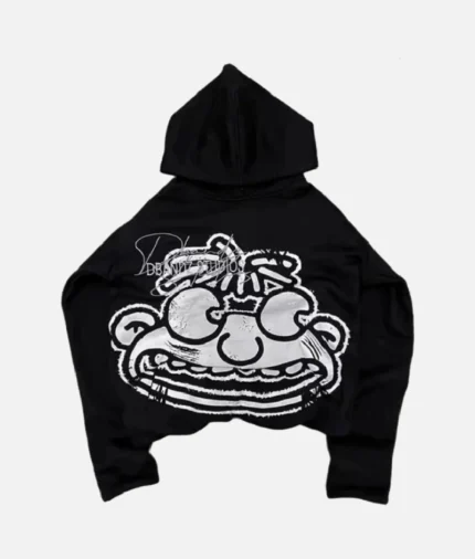Billionaire Studios Kid Wimpy Hoodie Black front view Back design of Kid Wimpy Hoodie by Billionaire Studios Close-up of Billionaire Studios hoodie logo Comfortable fit – Kid wearing Wimpy Hoodie Black outdoors