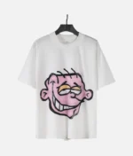 “Billionaire Studios New Fashion Head Printed Tee Off White front view” “Close-up of Billionaire Studios head print on off-white tee” “Model wearing Billionaire Studios printed tee in off white” “Street style look featuring Billionaire Studios fashion tee”