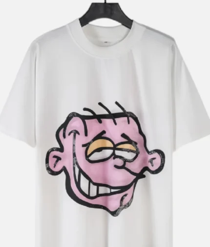 “Billionaire Studios New Fashion Head Printed Tee Off White front view” “Close-up of Billionaire Studios head print on off-white tee” “Model wearing Billionaire Studios printed tee in off white” “Street style look featuring Billionaire Studios fashion tee”